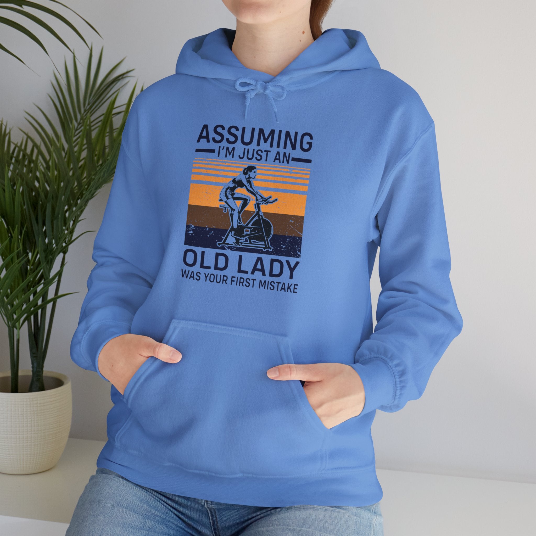 "Assuming I M Just An Old Lady Was Your First Mistake"  Unisex Heavy Blend™ Hooded Sweatshirt