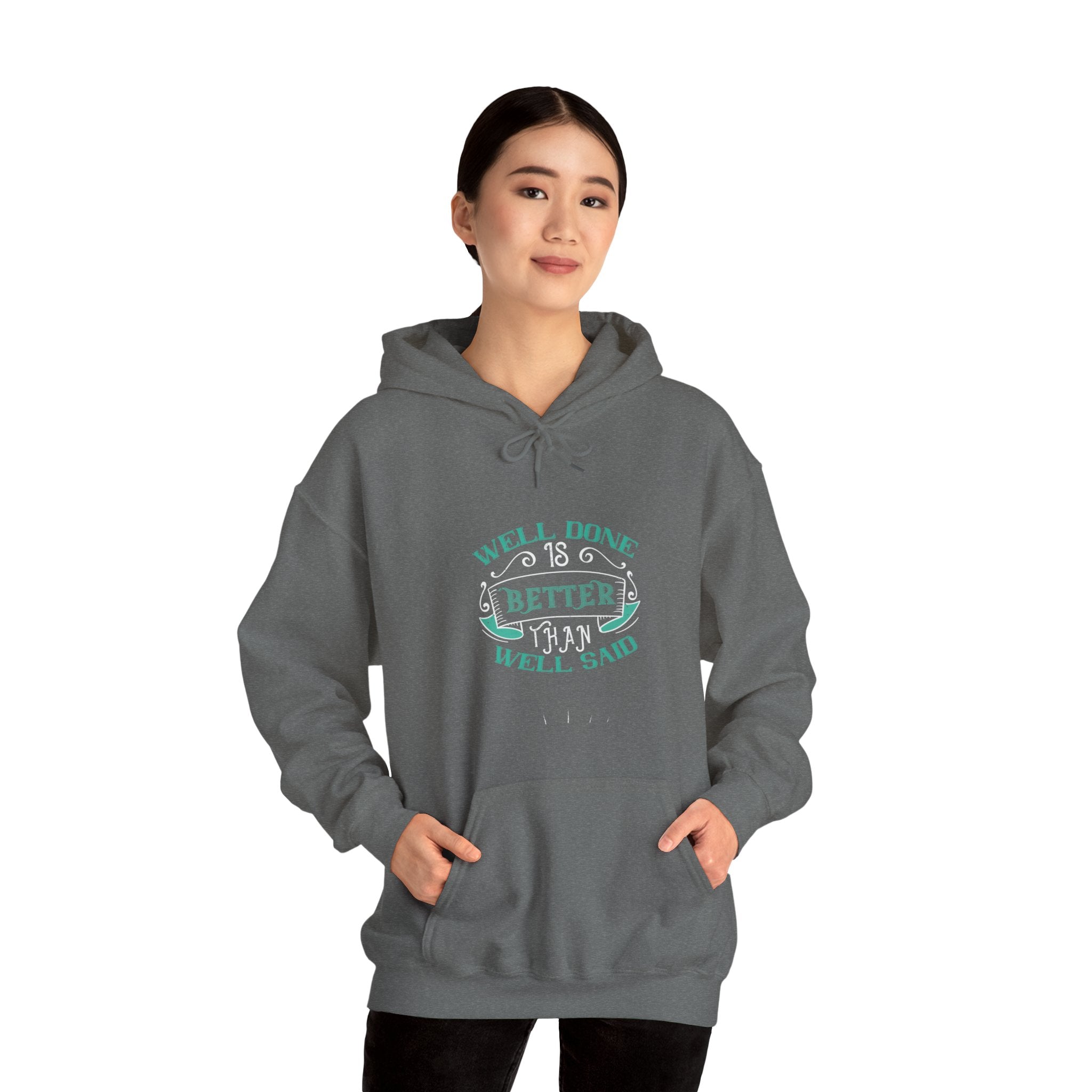 "Well done is better than well said"  Unisex Heavy Blend™ Hooded Sweatshirt