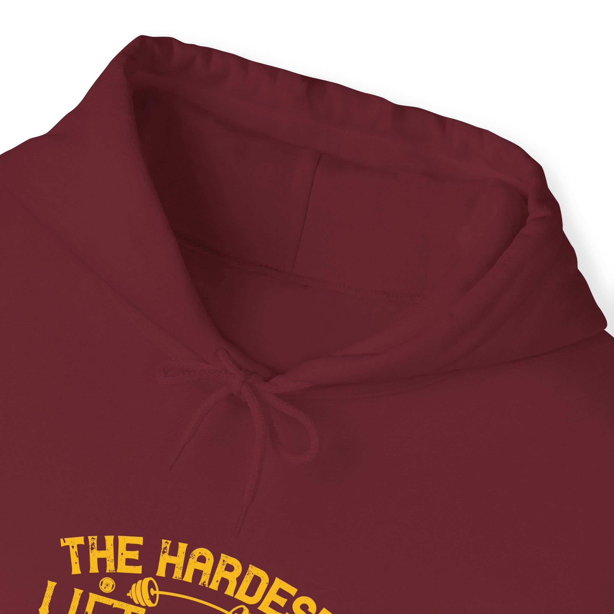 "The hardest lift of all is lifting your butt off the couch"  Unisex Heavy Blend™ Hooded Sweatshirt