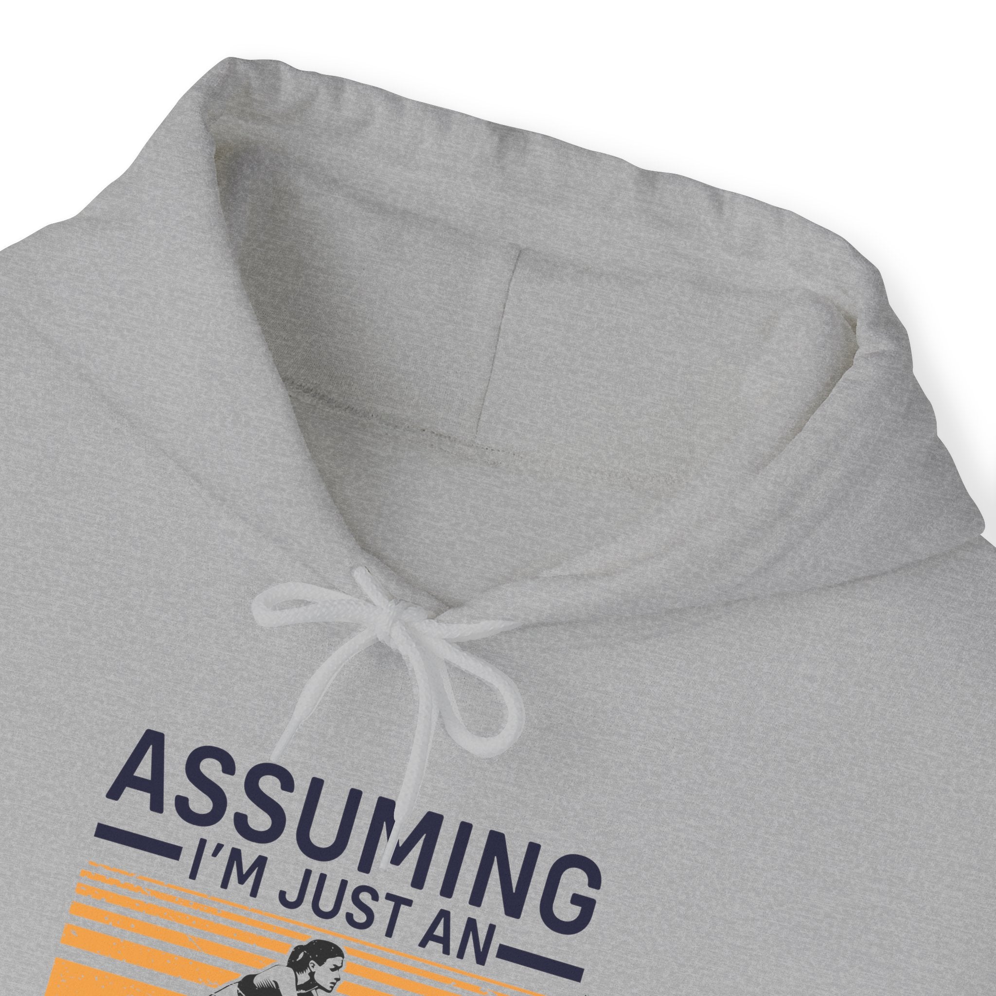 "Assuming I M Just An Old Lady Was Your First Mistake"  Unisex Heavy Blend™ Hooded Sweatshirt