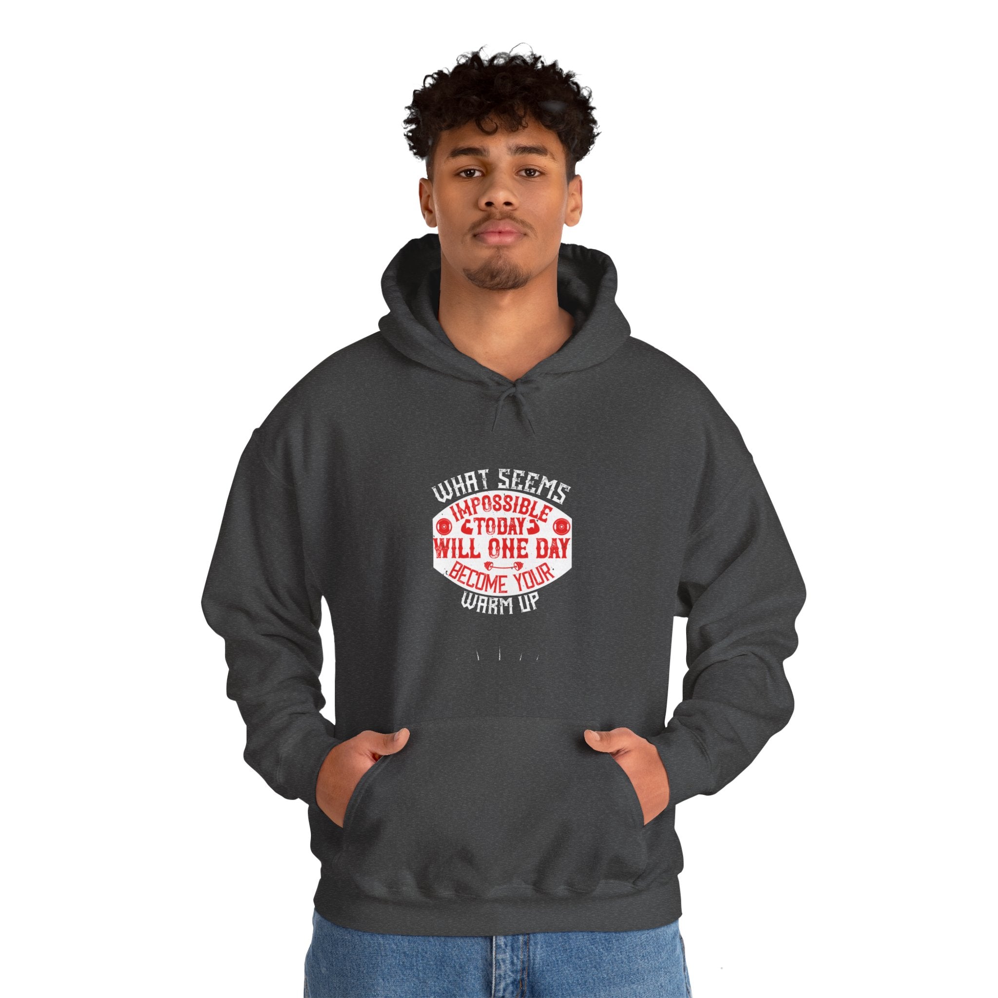 "What seems impossible today will one day become your warm-up" Unisex Heavy Blend™ Hooded Sweatshirt