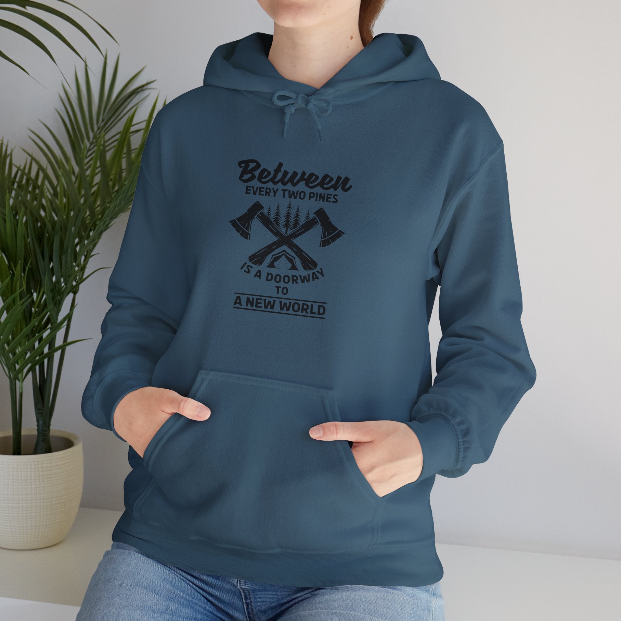 "Between Every Two Pines Is A Door To New World" Unisex Heavy Blend™ Hooded Sweatshirt