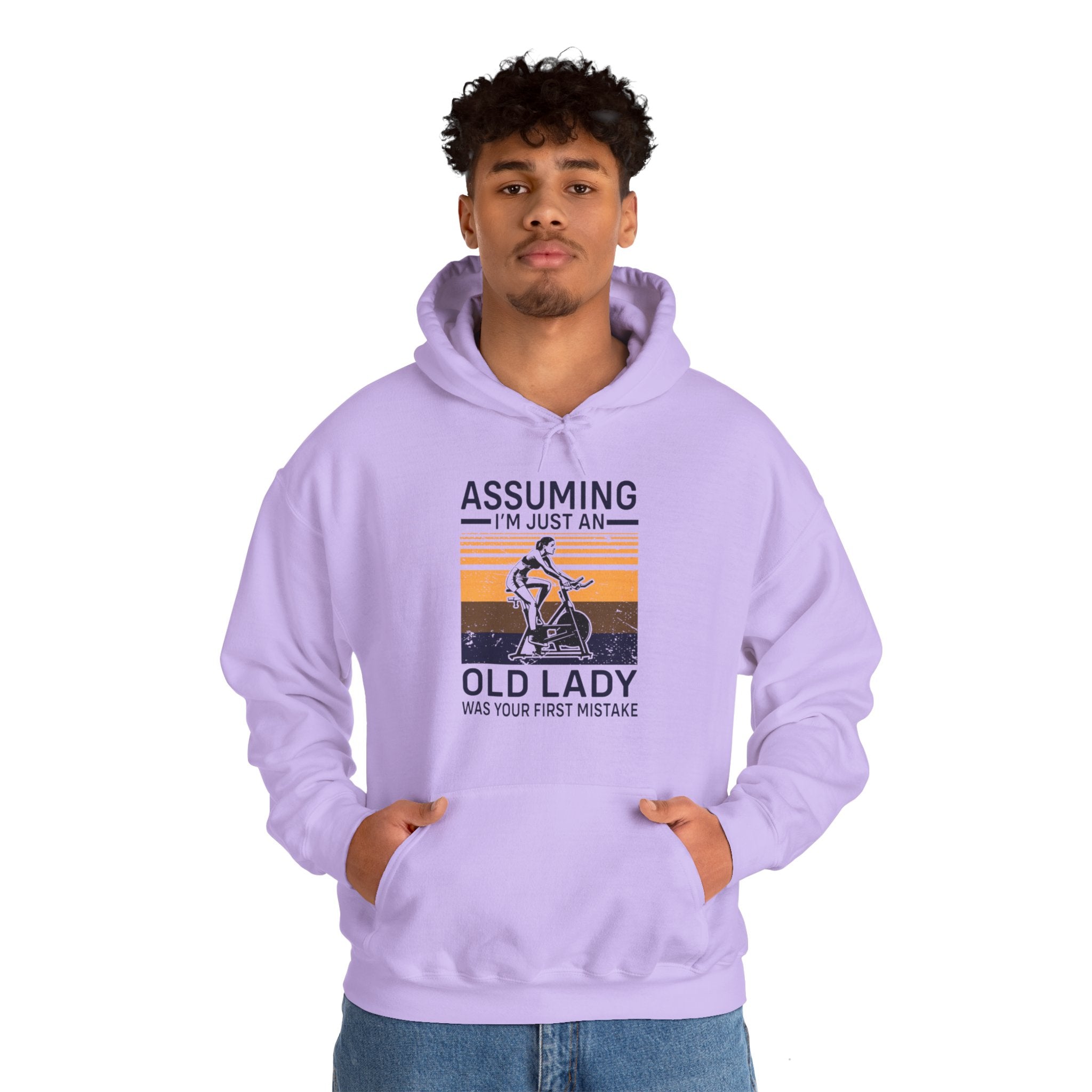 "Assuming I M Just An Old Lady Was Your First Mistake"  Unisex Heavy Blend™ Hooded Sweatshirt