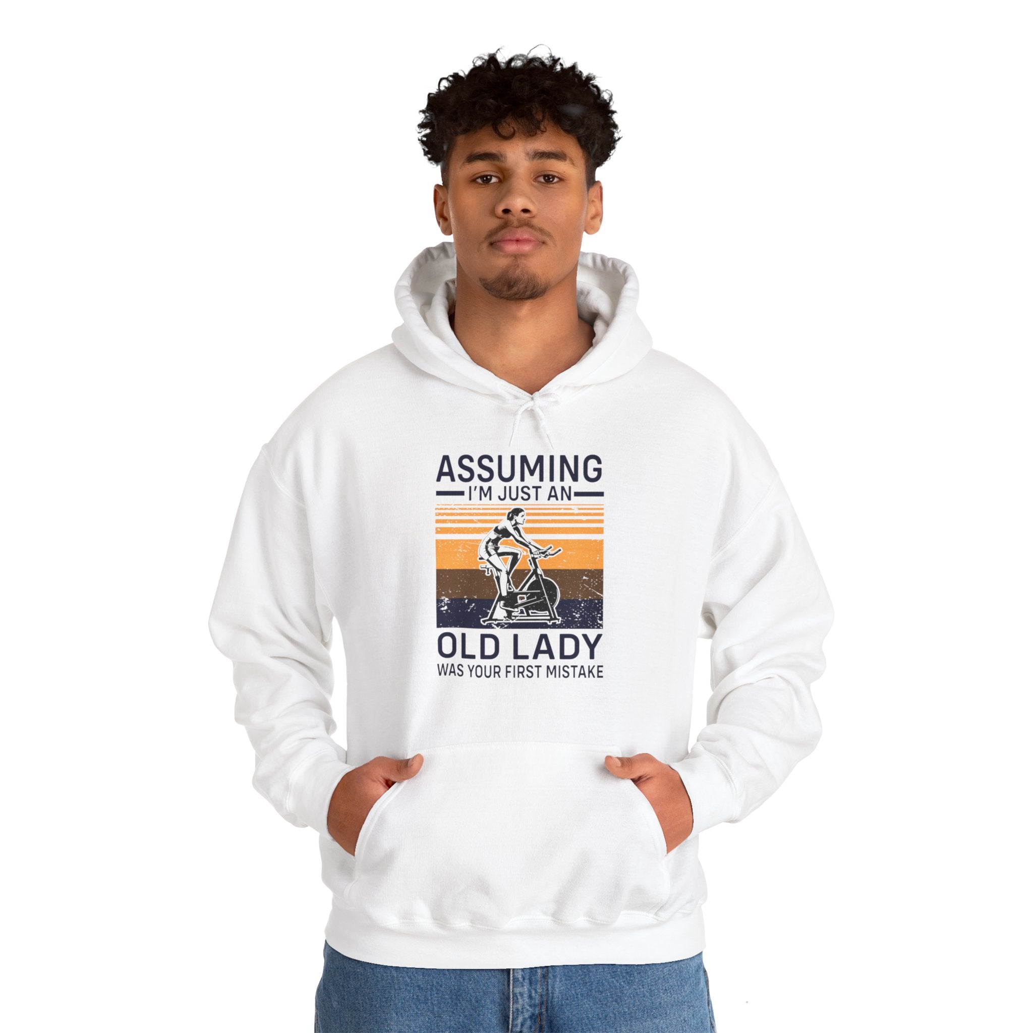 "Assuming I M Just An Old Lady Was Your First Mistake"  Unisex Heavy Blend™ Hooded Sweatshirt