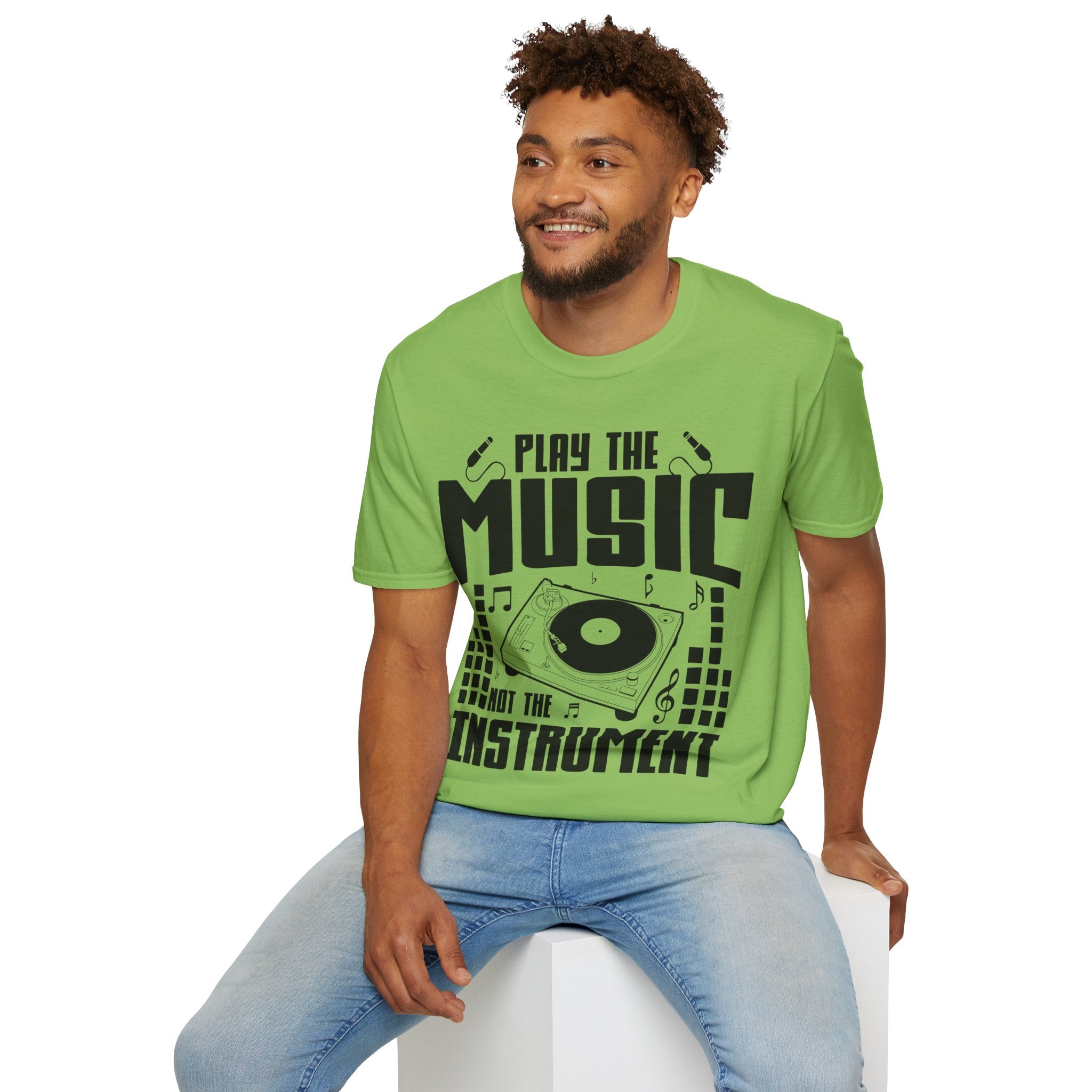 "Play The Music Not The Instrument"  Unisex Soft style T-Shirt